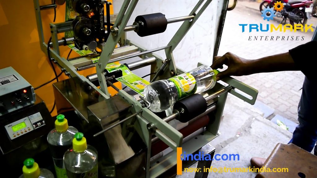 “Revolutionary Bottle Labeling Machine with Built-in MRP Date Printer for Effortless Automation”